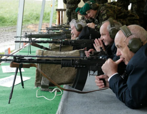 Swiss President Ueli Maurer pauses during a shooting-skills exercise — a several-hundred-year-old tradition — with the Foreign Diplomatic Corps in Switzerland on May 31, 2013.REUTERS/Denis Balibouse
