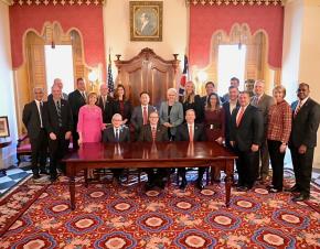 Photo of state and local leadership with Honda and LG Energy Solution taken on October 11, 2022, in the same location as the 1977 photo below. 