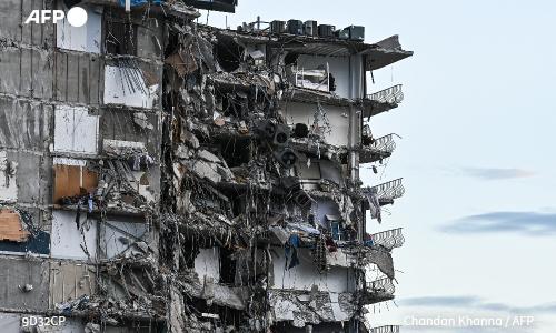 انهيار مبنى ، الصور نقلا عن AFP انهيار مبنى ، الصور نقلا عن AFP