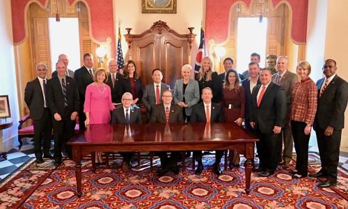 Photo of state and local leadership with Honda and LG Energy Solution taken on October 11, 2022, in the same location as the 1977 photo below.
