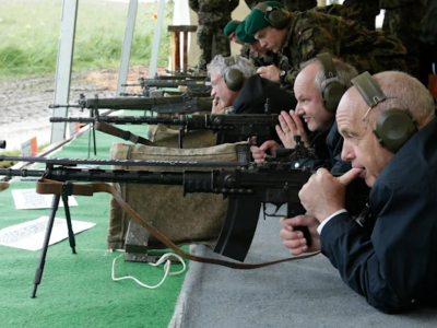 Swiss President Ueli Maurer pauses during a shooting-skills exercise — a several-hundred-year-old tradition — with the Foreign Diplomatic Corps in Switzerland on May 31, 2013.REUTERS/Denis Balibouse
